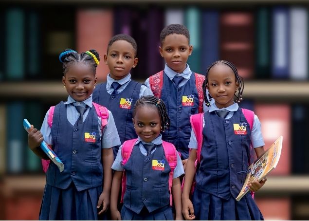 Dandave School pupils in uniform, backpacks ready